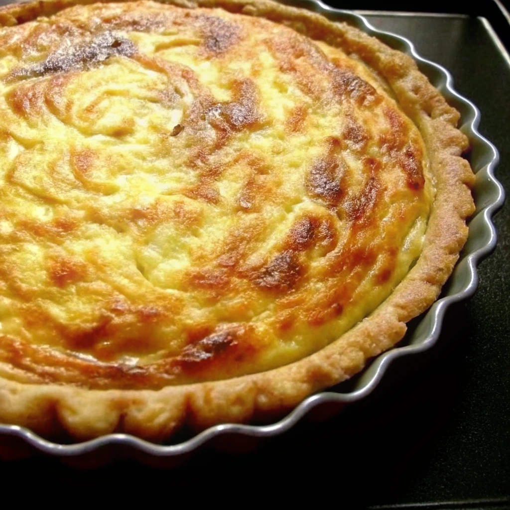 Quiche aux poireaux maison dorée au four avec une pâte croustillante et une garniture crémeuse aux poireaux